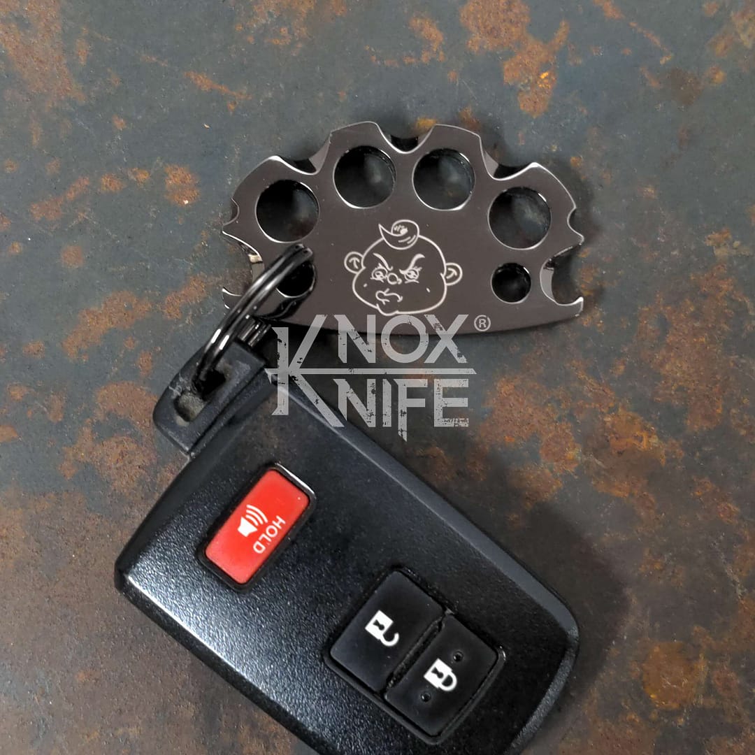 black chrome BabyKnucks Baby Brass Knuckles by KnoxKnives